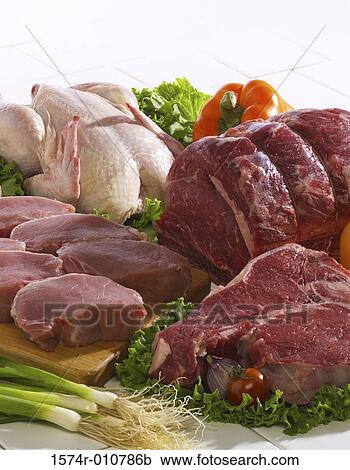 Stock Image - Assortment of raw meats. Fotosearch