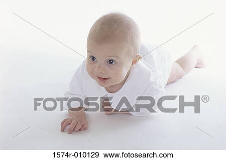 Baby crawling on the floor View Large Photo Image Stock Photo - Baby crawling on the floor. Fotosearch