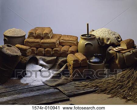 Stock Image - Bread with jar of flour and wheat. Fotosearch