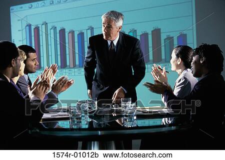 Business executives in a meeting View Large Photo Image Stock Image - Business executives in a meeting. Fotosearch