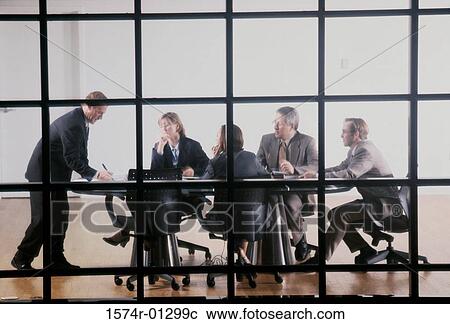 Business executives in a meeting View Large Photo Image Stock Image - Business executives in a meeting. Fotosearch