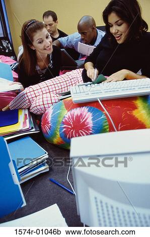 Stock Image - Business executives working from home. Fotosearch