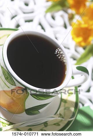 Close-up of a cup of coffee View Large Photo Image Stock Image - Close-up of a cup of coffee. Fotosearch