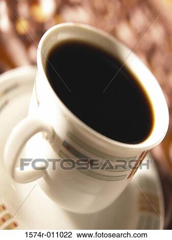 Close-up of a cup of coffee View Large Photo Image Stock Image - Close-up of a cup of coffee. Fotosearch