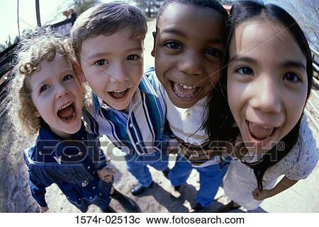 Close-up of a group of children standing View Large Photo Image Stock Image - Close-up of a group of children standing. Fotosearch