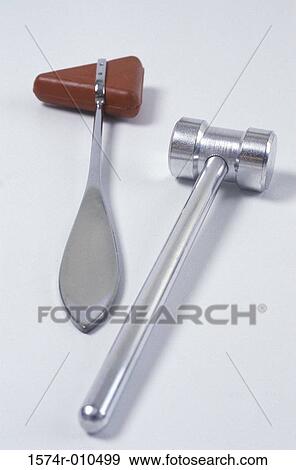 Stock Photo - Close-up of a mallet and reflex hammer. Fotosearch