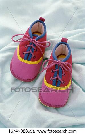 Close-up of a pair of baby booties View Large Photo Image Stock Image - Close-up of a pair of baby booties. Fotosearch