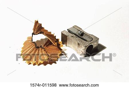 Close-up of a pencil sharpener and pencil shavings View Large Photo Image Stock Photo - Close-up of a pencil sharpener and pencil shavings. Fotosearch