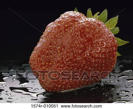 Close-up of a strawberry View Large Photo Image Stock Image - Close-up of a strawberry. Fotosearch