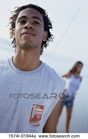Close-up of a teenage boy looking up View Large Photo Image Stock Image - Close-up of a teenage boy looking up. Fotosearch