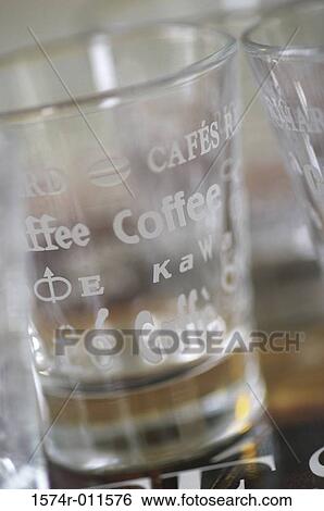 Close-up of an empty glass of coffee View Large Photo Image Stock Photograph - Close-up of an empty glass of coffee. Fotosearch