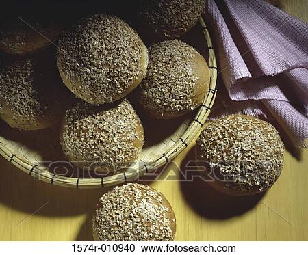 Close-up of bread buns in a basket View Large Photo Image Stock Image - Close-up of bread buns in a basket. Fotosearch