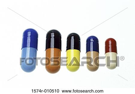 Stock Image - Close-up of capsules arranged in decreasing order of size. Fotosearch