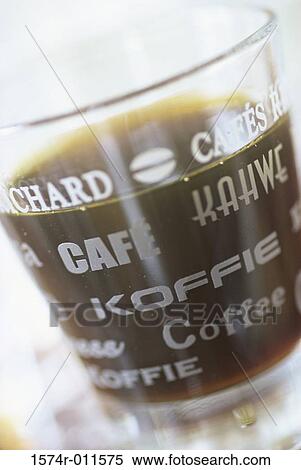 Close-up of coffee in a glass View Large Photo Image Stock Photography - Close-up of coffee in a glass. Fotosearch