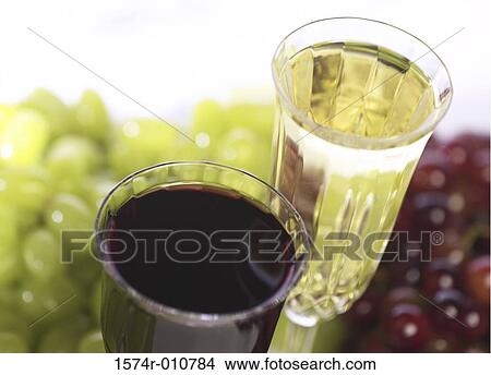 Close-up of glasses of red and white wine View Large Photo Image Picture - Close-up of glasses of red and white wine. Fotosearch