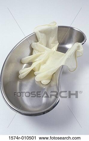 Close-up of gloves in a pan View Large Photo Image Stock Image - Close-up of gloves in a pan. Fotosearch