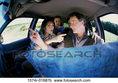 Couple arguing in a car over a map View Large Photo Image Stock Image - Couple arguing in a car over a map. Fotosearch