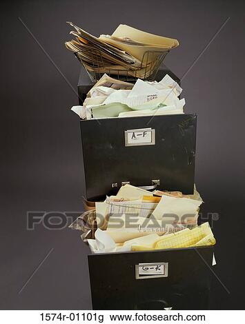 Stock Image - Filing cabinet with an open drawer. Fotosearch