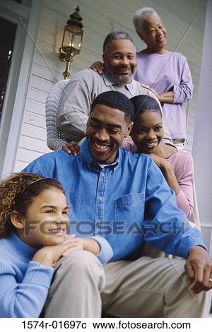 Grandparents sitting on the front porch with their son and granddaughter View Large Photo Image Stock Image - Grandparents sitting on the front porch with their son and granddaughter. Fotosearch