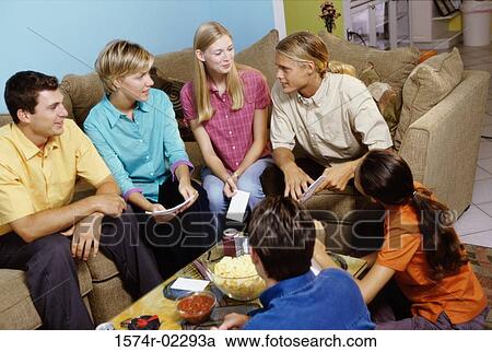 Group of teenagers having a group discussion View Large Photo Image Stock Image - Group of teenagers having a group discussion. Fotosearch