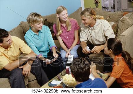 Group of teenagers having a group discussion View Large Photo Image Stock Image - Group of teenagers having a group discussion. Fotosearch