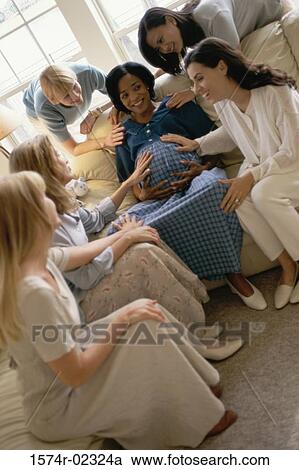 Group of young women at a baby shower View Large Photo Image Stock Image - Group of young women at a baby shower. Fotosearch