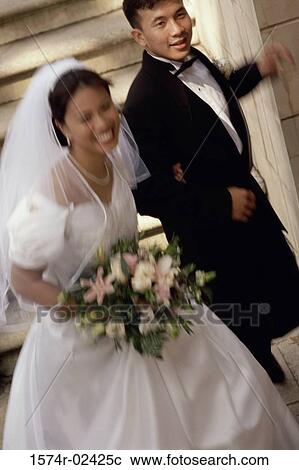 Stock Image - High angle view of a newlywed couple. Fotosearch