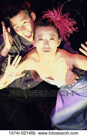 High angle view of a young couple dancing in a nightclub View Large Photo Image Stock Image - High angle view of a young couple dancing in a nightclub. Fotosearch