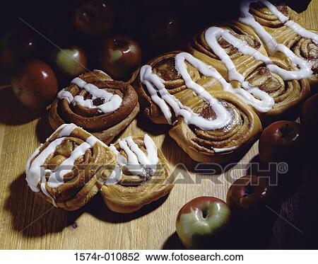 Stock Image - High angle view of cinnamon buns. Fotosearch