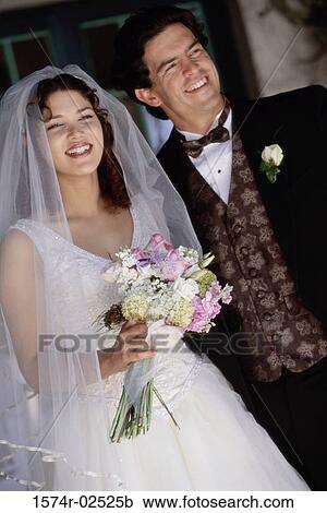 Newlywed couple smiling View Large Photo Image Stock Image - Newlywed couple smiling. Fotosearch