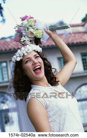 Newlywed young woman preparing to toss the bouquet View Large Photo Image Stock Image - Newlywed young woman preparing to toss the bouquet. Fotosearch