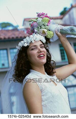 Newlywed young woman preparing to toss the bouquet View Large Photo Image Stock Image - Newlywed young woman preparing to toss the bouquet. Fotosearch