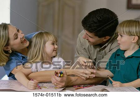 Parents and their children with coloring books View Large Photo Image Stock Image - Parents and their children with coloring books. Fotosearch