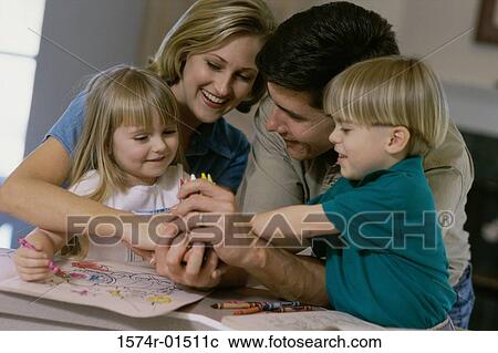 Parents and their children with coloring books View Large Photo Image Stock Image - Parents and their children with coloring books. Fotosearch