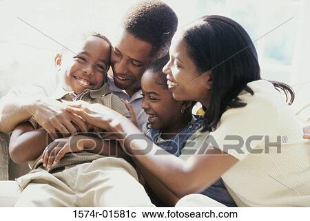 Parents playing with their son and daughter View Large Photo Image Stock Image - Parents playing with their son and daughter. Fotosearch