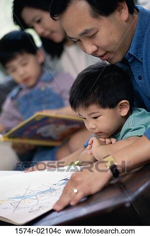 Parents watching their two sons coloring with crayons View Large Photo Image Stock Image - Parents watching their two sons coloring with crayons. Fotosearch