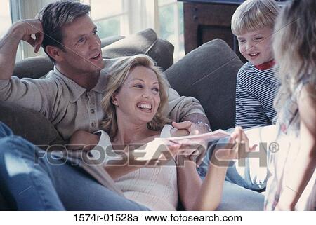 Stock Image - Parents with their son and daughter. Fotosearch
