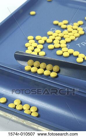 Pill separation in a tray View Large Photo Image Stock Photo - Pill separation in a tray. Fotosearch