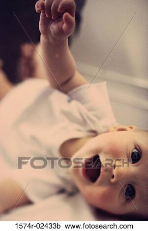 Stock Image - Portrait of a baby boy smiling. Fotosearch