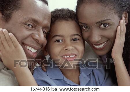 Stock Image - Portrait of a boy with his parents. Fotosearch