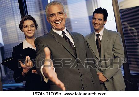 Portrait of a business executive extending his arm to shake hands View Large Photo Image Stock Image - Portrait of a business executive extending his arm to shake hands. Fotosearch