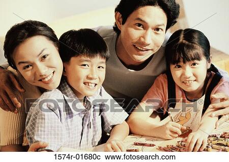 Portrait of a couple with their son and daughter View Large Photo Image Stock Image - Portrait of a couple with their son and daughter. Fotosearch