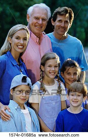 Stock Image - Portrait of a family smiling. Fotosearch