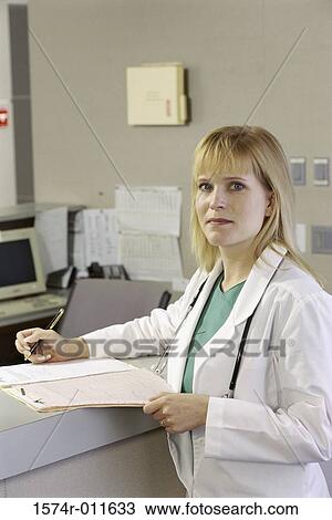 Portrait of a female doctor in a hospital View Large Photo Image Stock Image - Portrait of a female doctor in a hospital. Fotosearch