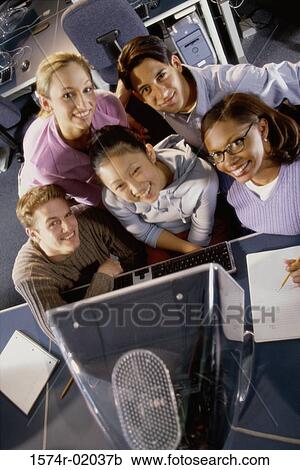 Stock Image - Portrait of a group of young people smiling. Fotosearch
