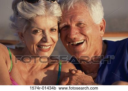 Portrait of a senior couple laughing View Large Photo Image Stock Image - Portrait of a senior couple laughing. Fotosearch