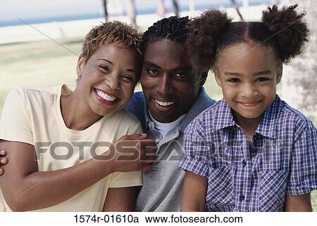 Portrait of parents with their daughter View Large Photo Image Stock Image - Portrait of parents with their daughter. Fotosearch