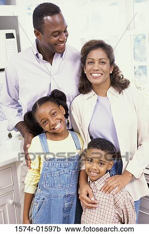 Portrait of parents with their son and daughter View Large Photo Image Stock Image - Portrait of parents with their son and daughter. Fotosearch