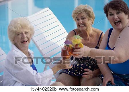 Portrait of three senior women toasting glasses of red wine View Large Photo Image Stock Image - Portrait of three senior women toasting glasses of red wine. Fotosearch