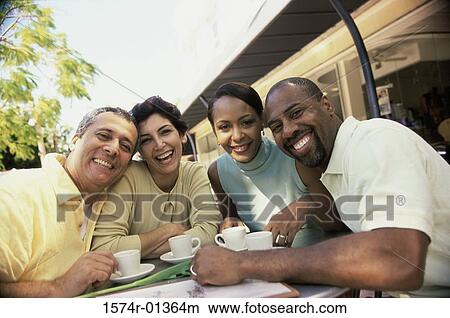 Portrait of two mature couples smiling View Large Photo Image Picture - Portrait of two mature couples smiling. Fotosearch